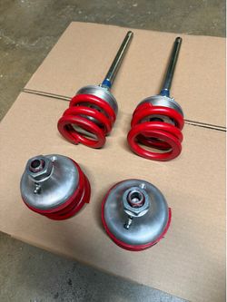 Classic Austin Morris Mini Red Spring with adjustable ride height