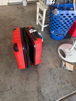 Red Rolling Suitcase for sale