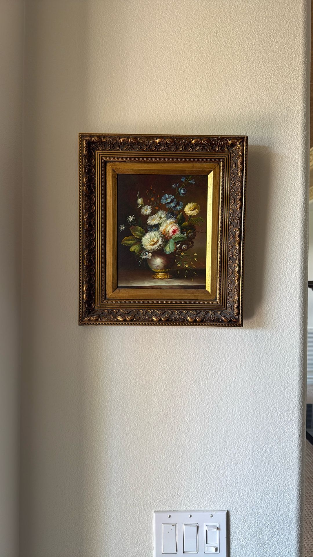 Framed floral painting