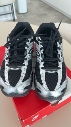 Silver and black Nike