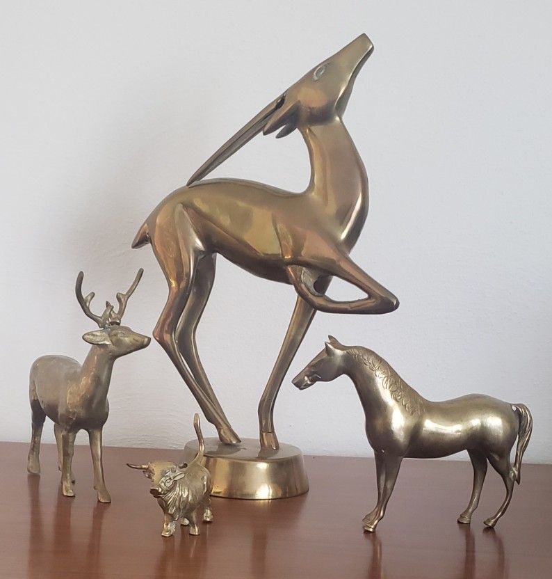 4 Mid-Century Modern Brass Figures