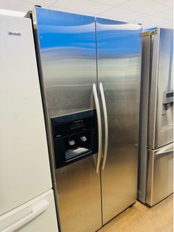 Kitchen AID side by side refrigerator