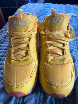 Yellow fila gym shoes