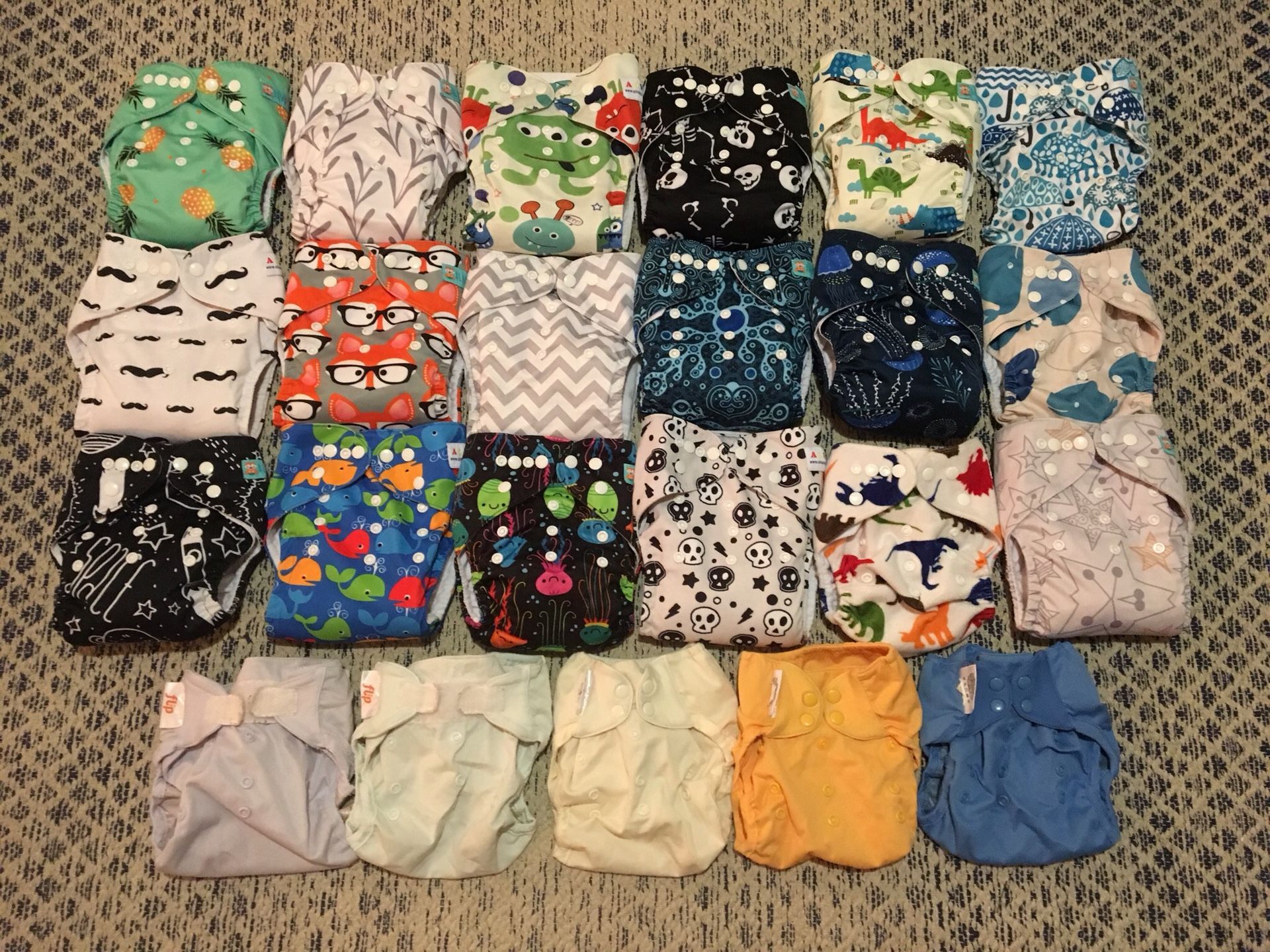 Cloth diaper stash - 23 total diapers, with 42 microfiber and charcoal bamboo liners, 18 cloth wipes, and 1 pail liner