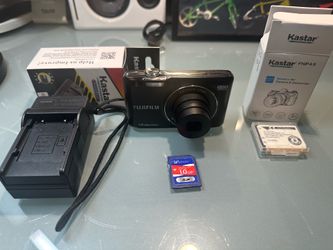 Fujifilm FinePix JX500 digital camera with battery charger
