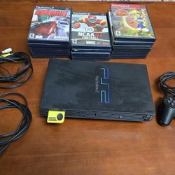 Playstation 2 With Multiple Games