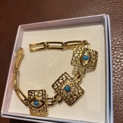 Elegant Gold and Blue Bracelet