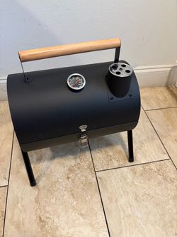 Parrilla portátil a carbón