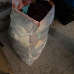 Garbage Bag Full Of Womans Cloths 