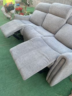 Vendo Sillón requinable Nuevo Color gris En 200