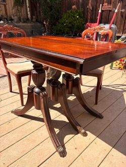 Antique Dining Table with 2 chairs and 4 Leafs