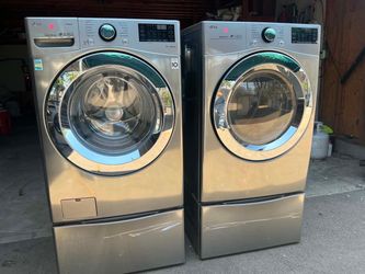 Washer and dryer set with pedestal
