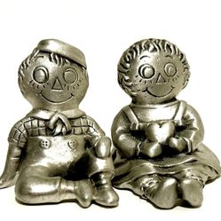 vintage metal Raggedy Ann and Andy figurines,