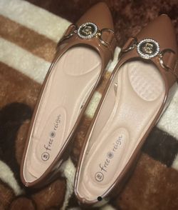 Elegant Brown Flats With Gold Embellishments 