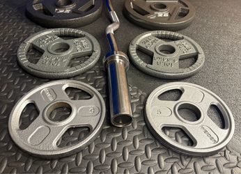 NEW Olympic Equipment Curl Bar of 20# with Cooper Bearings and Plates 2X35s, 2X25s, 2X10s and 2X5s pounds. Brute 170#