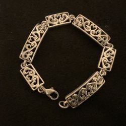 7.5” Solid SilverTone Bracelet With Designs