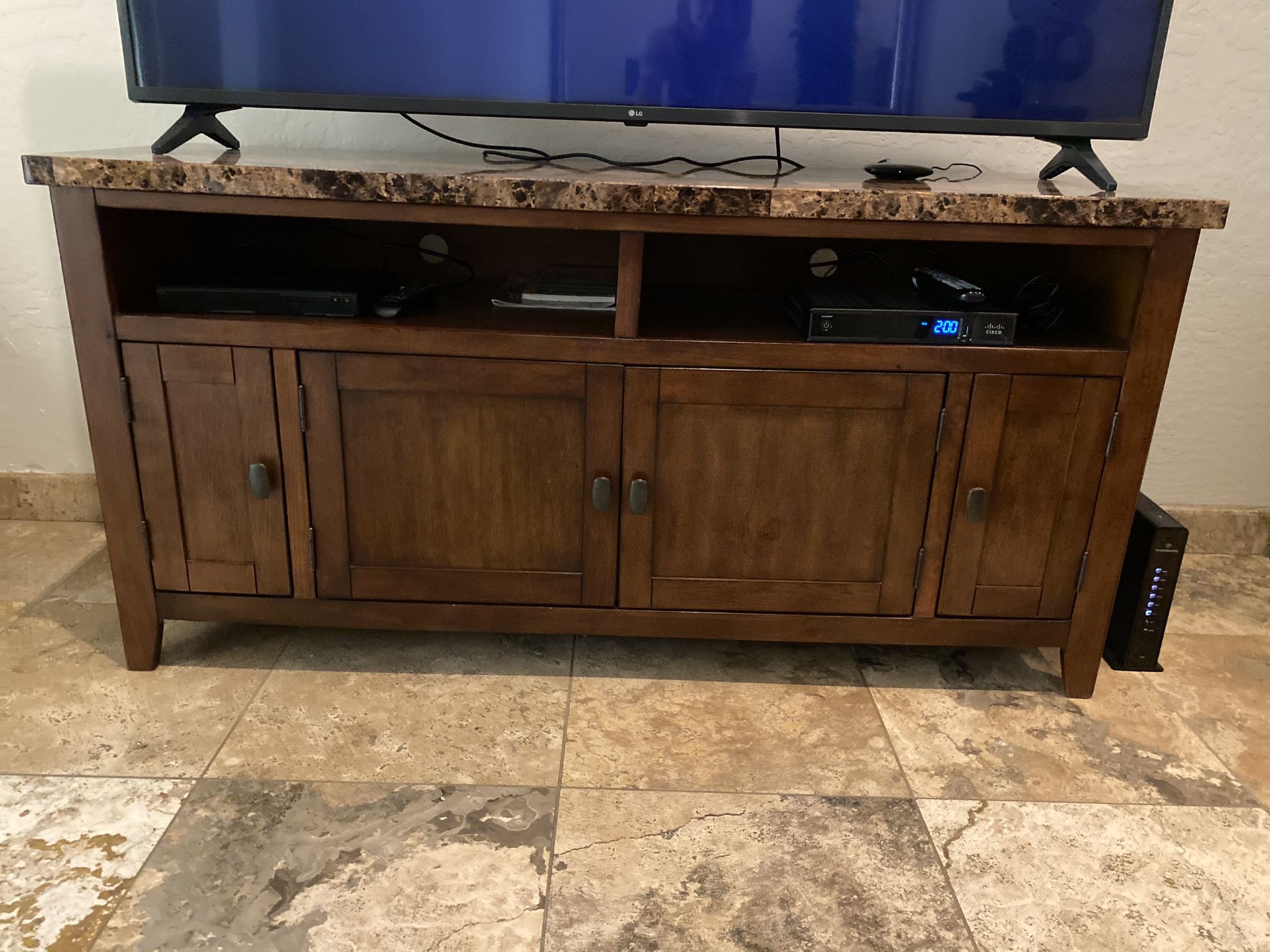 Beautiful marble top tv stand. Fits a 65” nicely