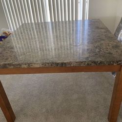 Spanish brown marble top table