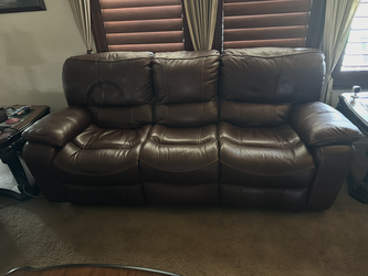 Two power Leather Recliner Couches