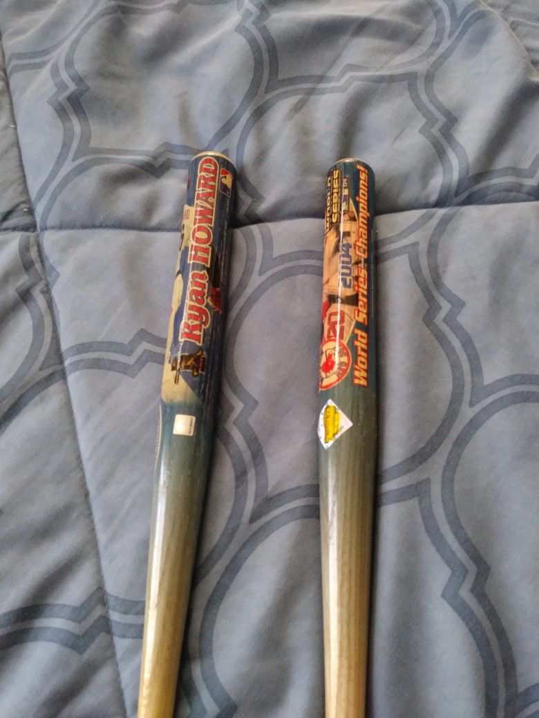 Mini baseball bats good condition