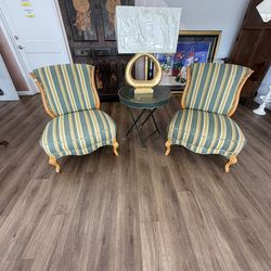 2 T.H. Robsjohn-Gibbings chairs covered in Lou Lou de la Falaise fabric With carved legs