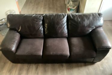 Lazy boy couch with matching recliners, coffee table, and end table
