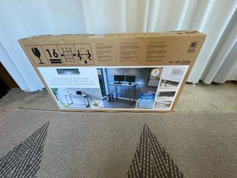 Tresanti Aurora 47" Adjustable Height Desk with LED Lighting. New in the box. Sealed