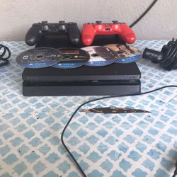 Ps4 Slim, 1TB, 4 Games, 2 Controllers, 1 Camera, 1 Power Cord, 1 Charger And No HDMI 