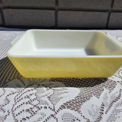 yellow PYREX casserole