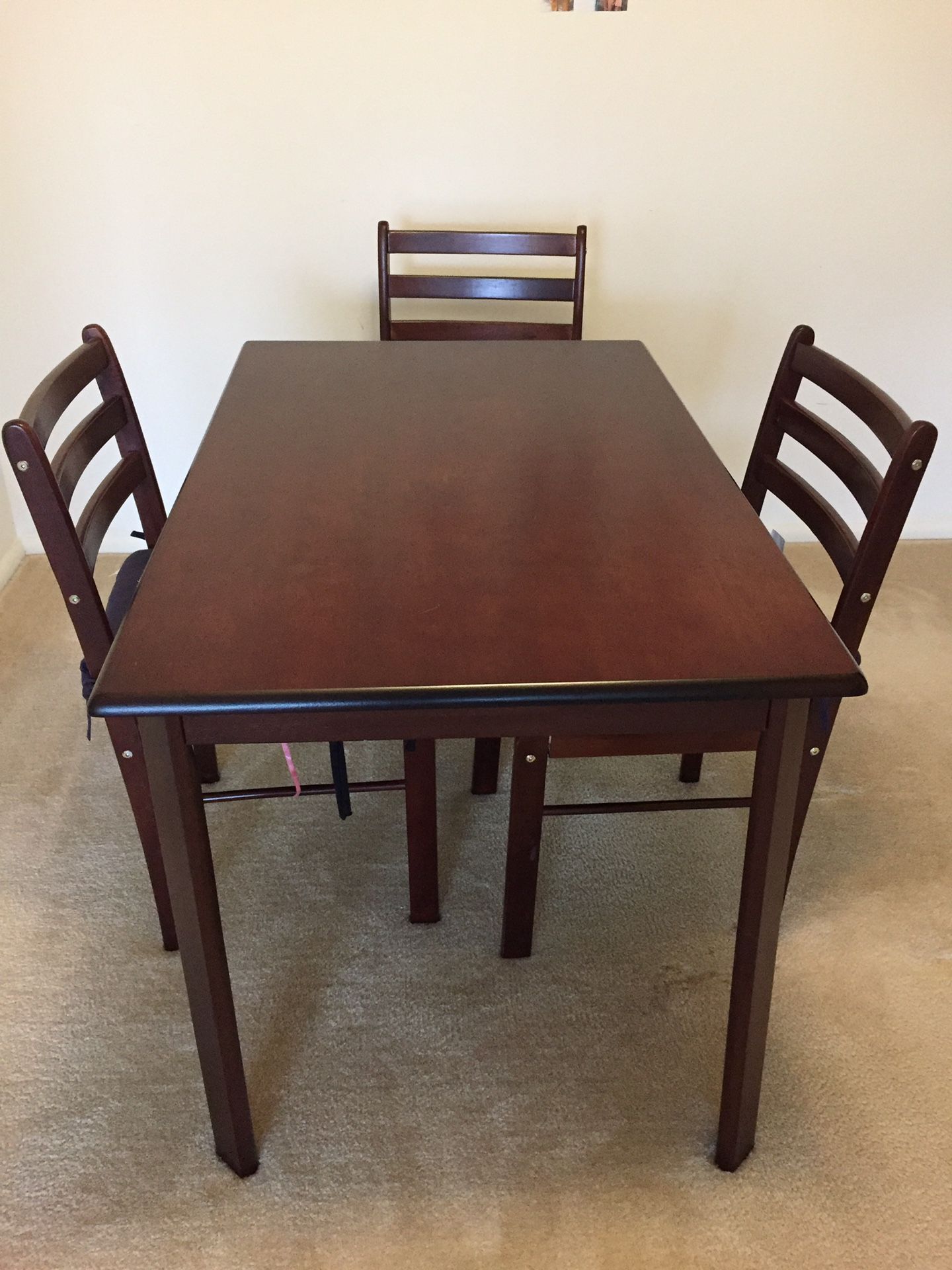 Dinning table with 4 chairs (3 chairs shown in pic)