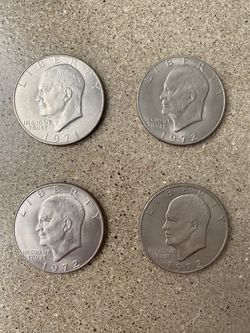 Eisenhower “Ike” Silver Dollar Coins (Set of 4)