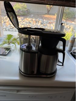 stainless steel Bonavita Connoisseur 8-Cup One-Touch Coffee Brewer with a thermal carafe. W/ filters