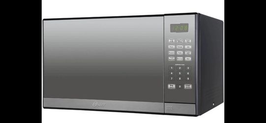 Oster 1.3 Cu. ft. Stainless Steel with Mirror Finish Microwave Oven with Grill