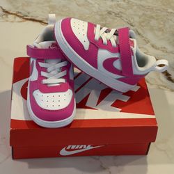 Nike pink and white toddler shoes/ sneakers 