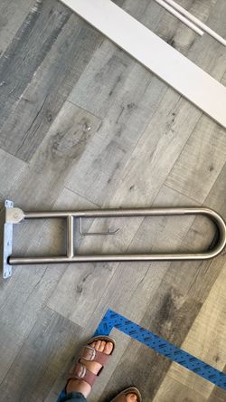 Toilet grab bar