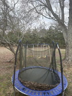 Trampoline And Swing Set