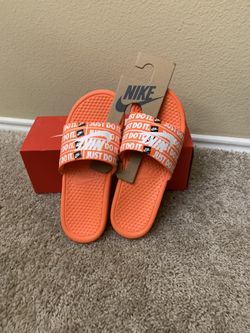 Orange Nike Slides