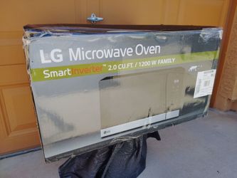 LG microwave oven smart inverter 2.0 cubic feet 1200 Watts with safety lock. New