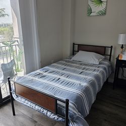 2 Twin beds almost new Giving away the mattress and comforters for free with purchase of the beds