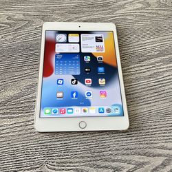 Apple iPad Mini 4 in excellent condition- 64GB- WiFi/Cellular-Unlocked. $80