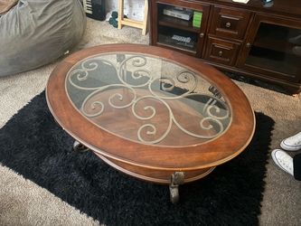 Oval Wood and Glass Coffee Table with Scrollwork