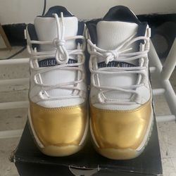 Jordan 11’s retro Low Gold 