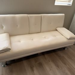 white faux leather futon