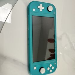 Nintendo Switch Lite - Teal - Barely Used 