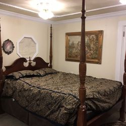 Antique queen poster bed