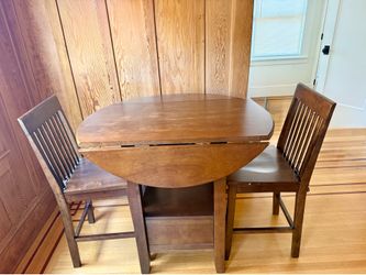 Wood bistro table and two chairs