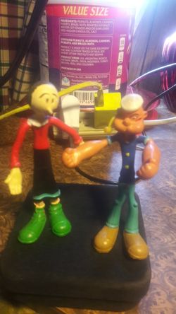 2 Popeye figures 4 inches taller good condition