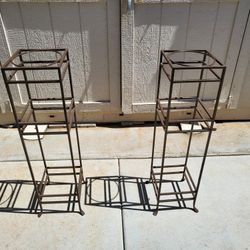 2 metal powder coated brown plant holders.  $30 Dollars for both 