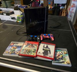 Sony Ps3 with 8 games