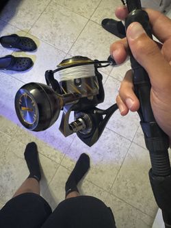 Penn authority 4500hs new with box on a black fin rod